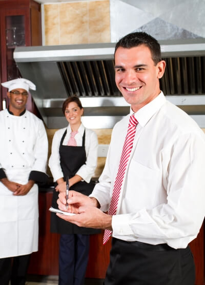 Happy restaurant manager with cleaning company