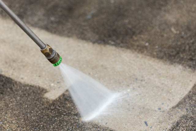 pressure washer in use